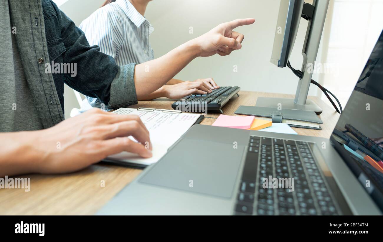 Team of programmers working together development Website design and coding technologies in a software develop company office, Coworkers Team concept Stock Photo