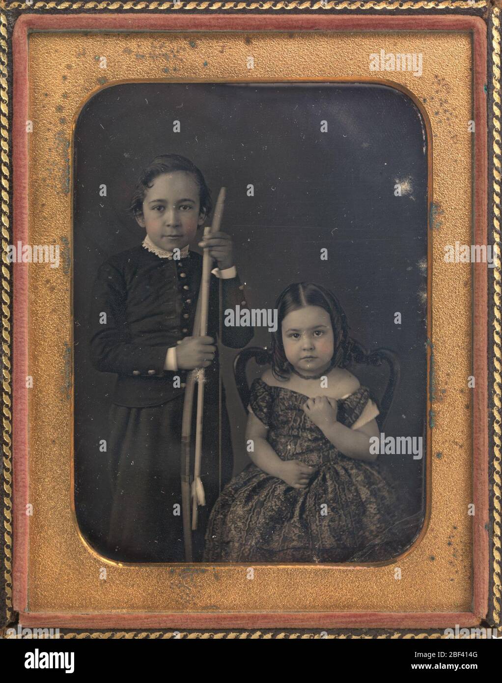 Thomas and Frances Eakins. Thomas Eakins, who would one day be regarded as America's leading realist painter of the nineteenth century, posed with his sister for this portrait when he was about seven years old. Stock Photo