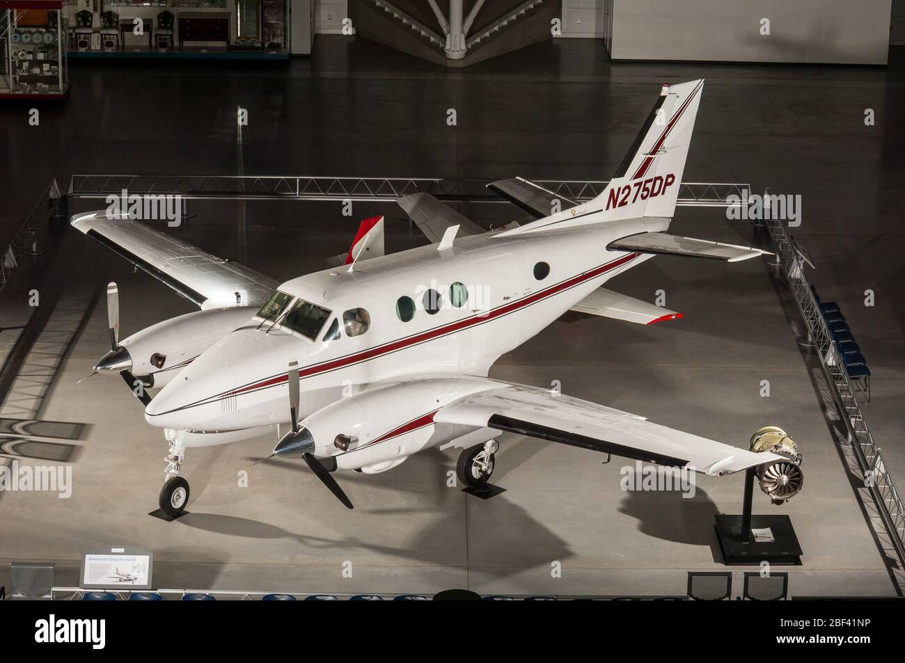 Beechcraft King Air 6590. Seven/ten place, low-wing, twin-turboprop business aircraft; white with red and gray trim. Pratt and Whitney Canada PT6A-6 engines.The Beechcraft King Air is the world's most popular turboprop aircraft. Stock Photo