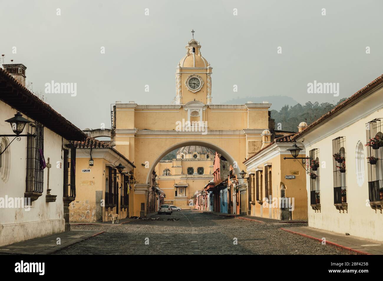 Empty streets as curfew begins in colonial Antigua Guatemala, a popular tourist destination, businesses closed due to coronavirus pandemic quarantine Stock Photo