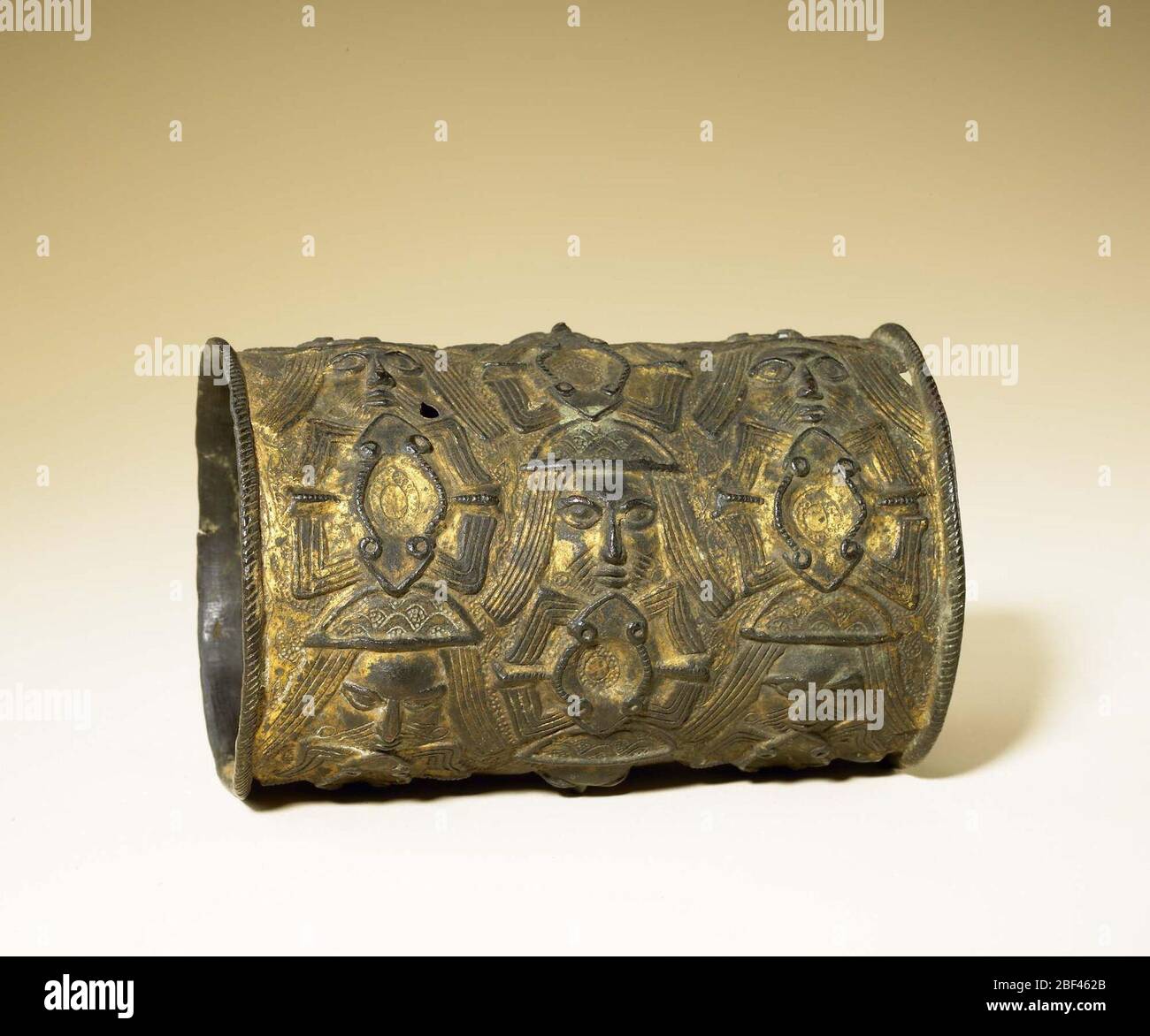 Benin kingdom court style; Nigeria; 17th-18th century; Copper alloy, gilt traces; H x Dia: 13.3 x 9.4 cm (5 1/4 x 3 11/16 in.) Stock Photo
