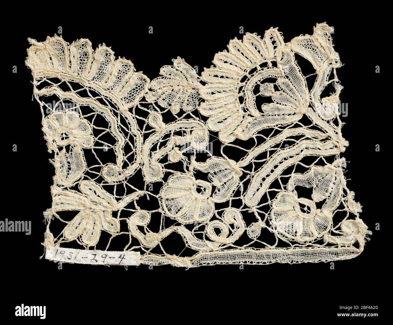 Fragment. Edging with small piece of insertion attached. Pattern of ...