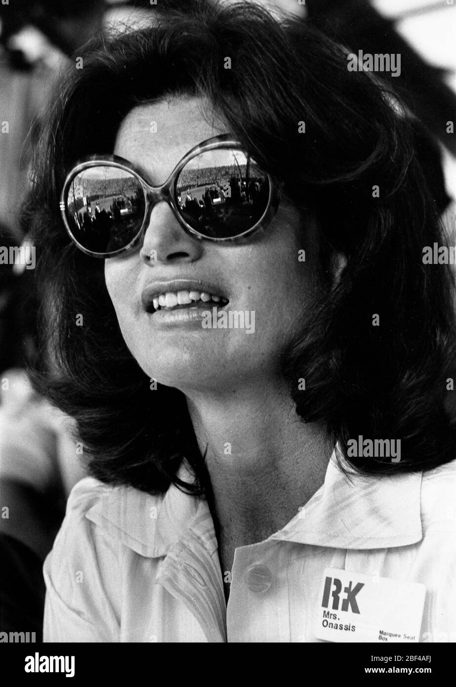 Former First Lady of the United States, JACQUELINE KENNEDY ONASSIS wearing  large sunglasses at a sporting event Stock Photo - Alamy