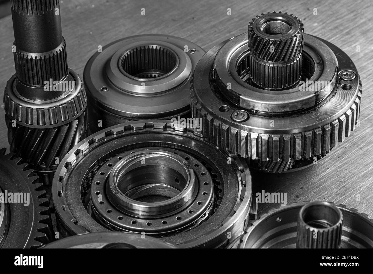 Set of various engine and gearbox spare parts. Shiny gears for