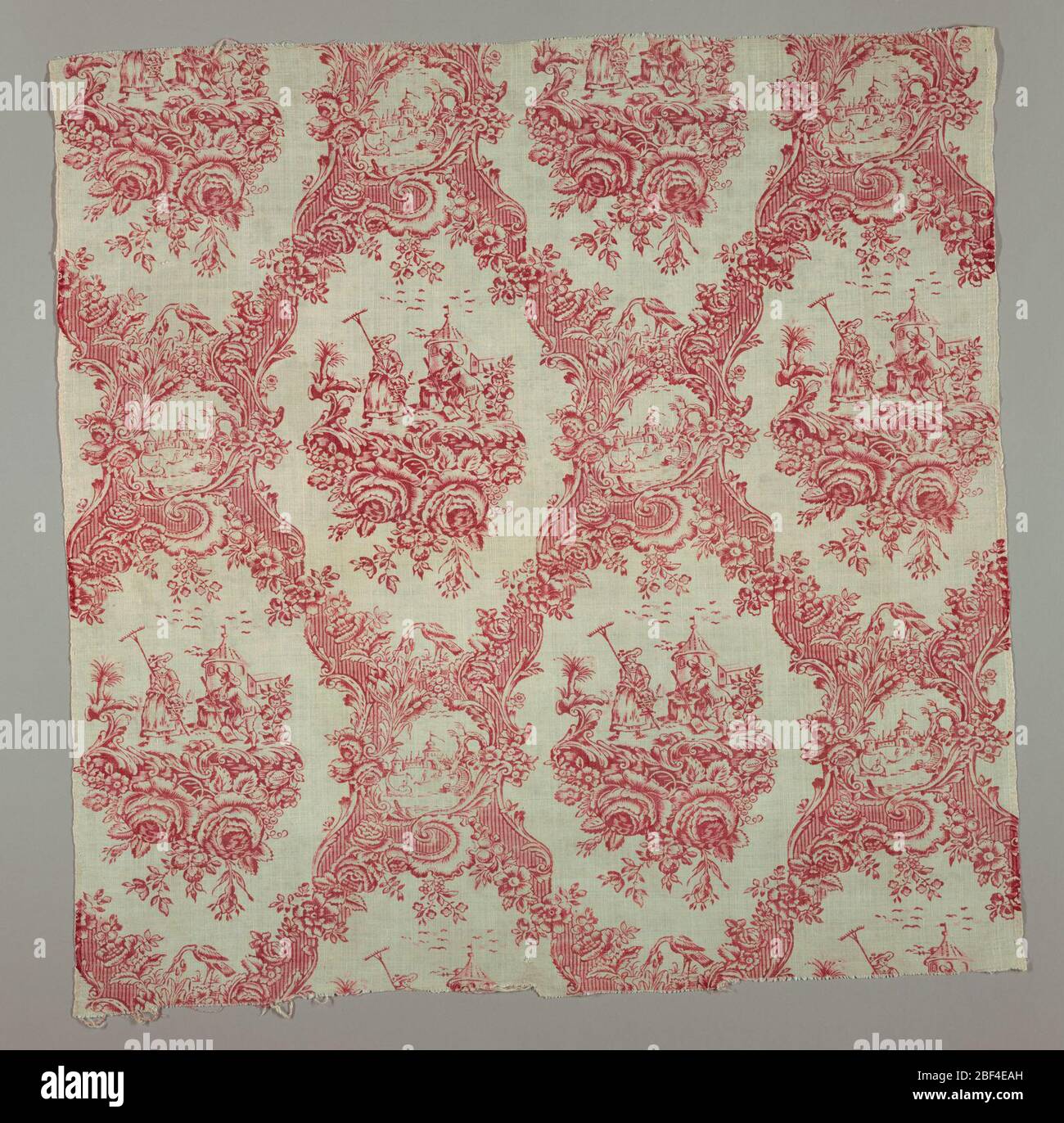 Textile. Red and white textile in a diamond lattice pattern created by ...