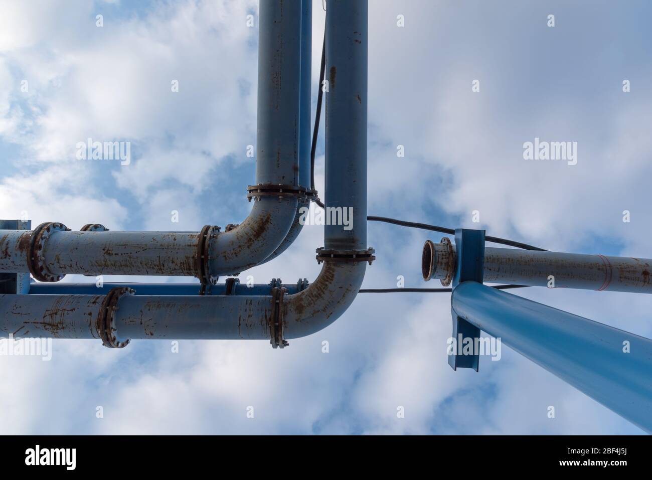 Water pipe system on a construction site with sky in the background Stock Photo