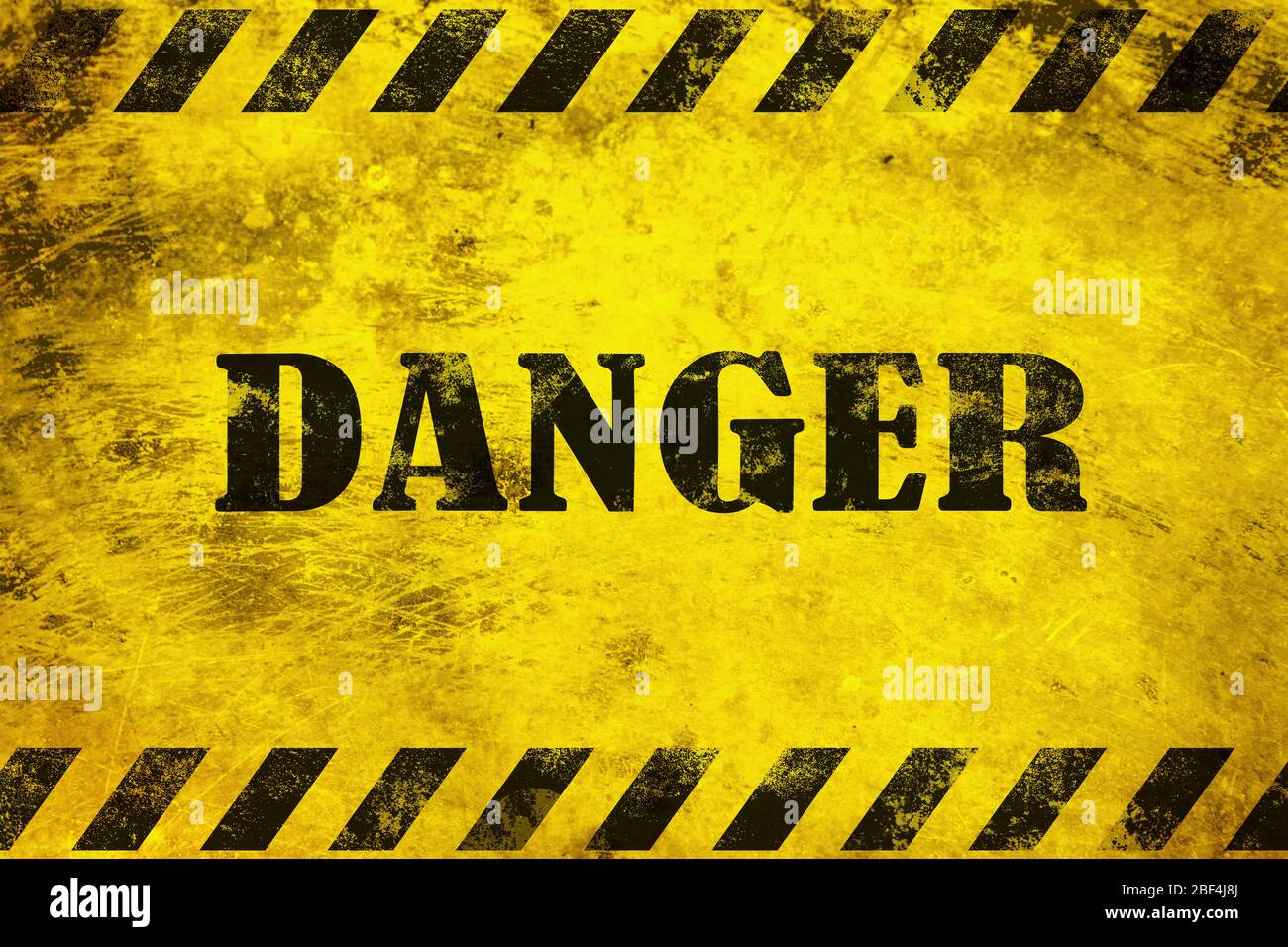 Danger black text on yellow background Stock Photo - Alamy