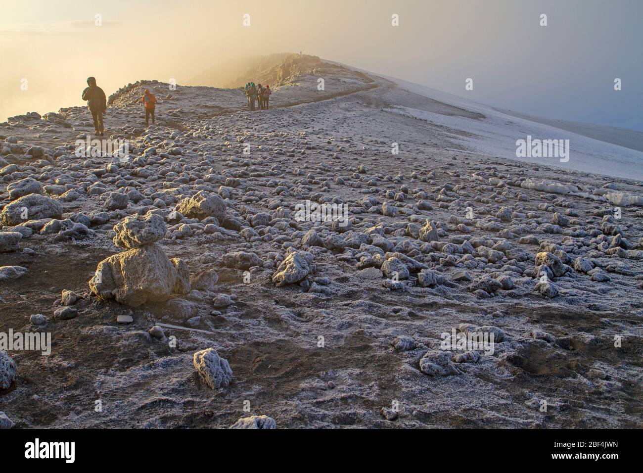 Hikers on the summit ridge of Mt Kilimanjaro Stock Photo