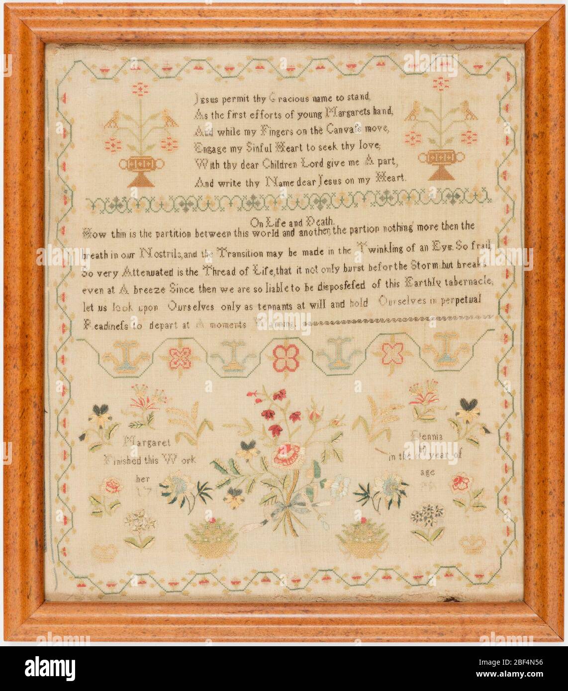 Sampler Verses Worked In Fine Black Cross Stitch On A Natural Linen Ground With A Bouquet Of Flowers Stylized Running Vine Borders Stock Photo Alamy