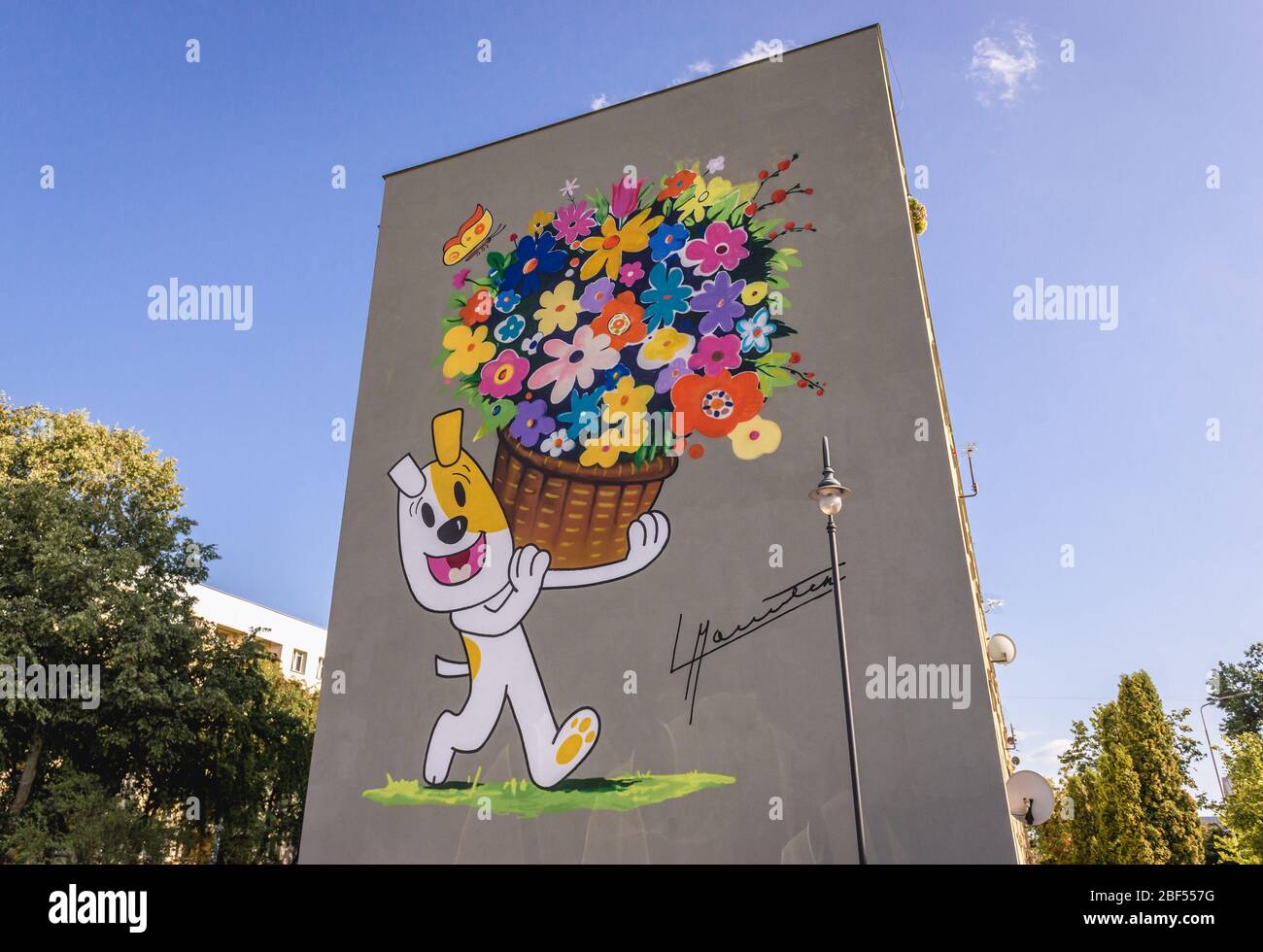Reksio Polish cartoon character painting on a residential building wall in Suwalki city, located in Podlaskie Voivodeship of northeastern Poland Stock Photo