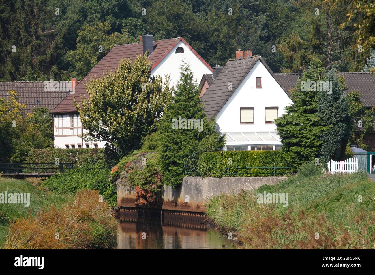 Residential houses on the Wörpe river, Lilienthal, Lower Saxony, Germany, Europe Stock Photo