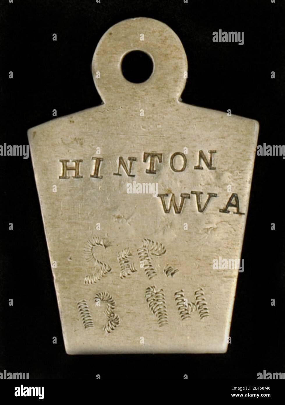 Hinton West Virginia Owney tag. The small town of Hinton, West Virginia, was well known to employees of the Railway Mail Service. The Chesapeake and Ohio Railway built a line through the town in the 1870s, making it a major terminal point. Stock Photo