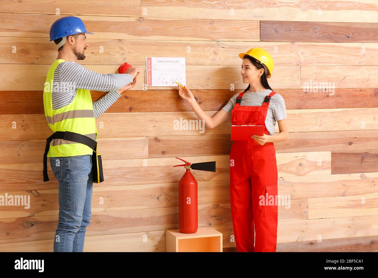 Fire safety specialists inspecting building Stock Photo Alamy