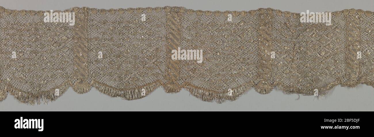 Trimming. Wide border of metallic silver lace in all-over small scale  repeated diamond shape, divided at intervals with a stripe. Outer edge is  scalloped Stock Photo - Alamy