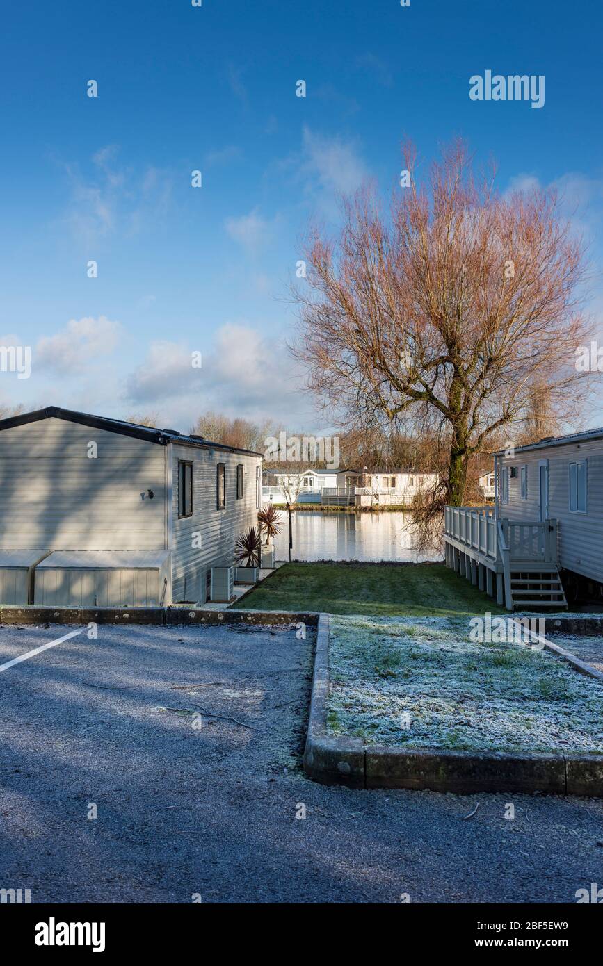 Static caravans by lake in Cotswold Water Park, South Cerney