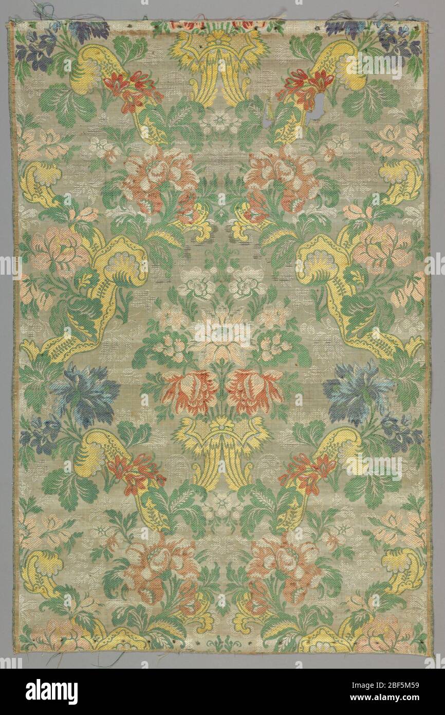 Polychrome Textile Textile. Symmetrical arrangement of polychrome flowers on off-white ...