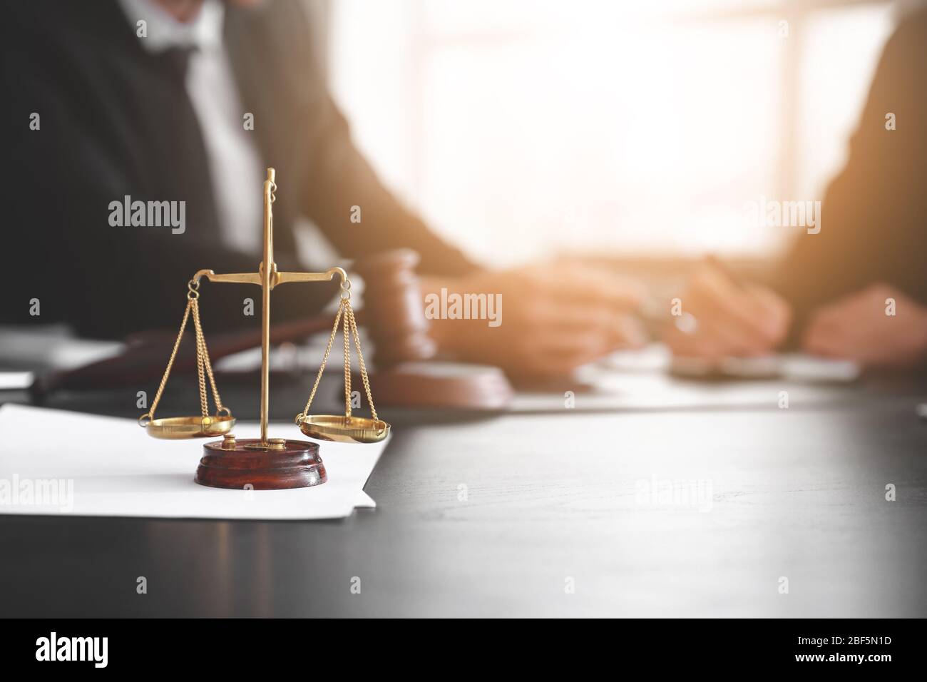 Scales of justice on table of notary public in office Stock Photo - Alamy