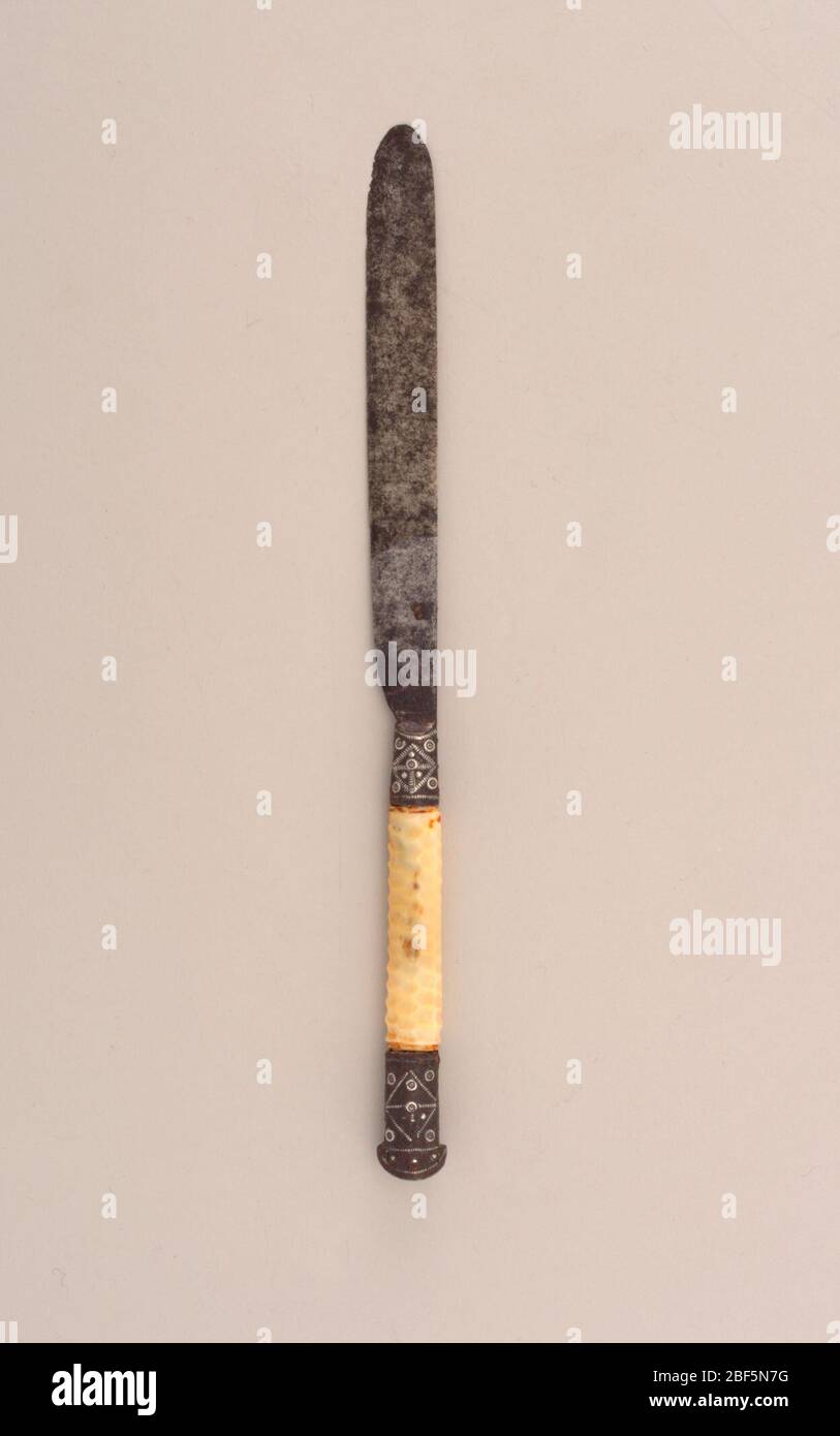 Wedding knife. Blade straightsided and tapering to a point. Hollow