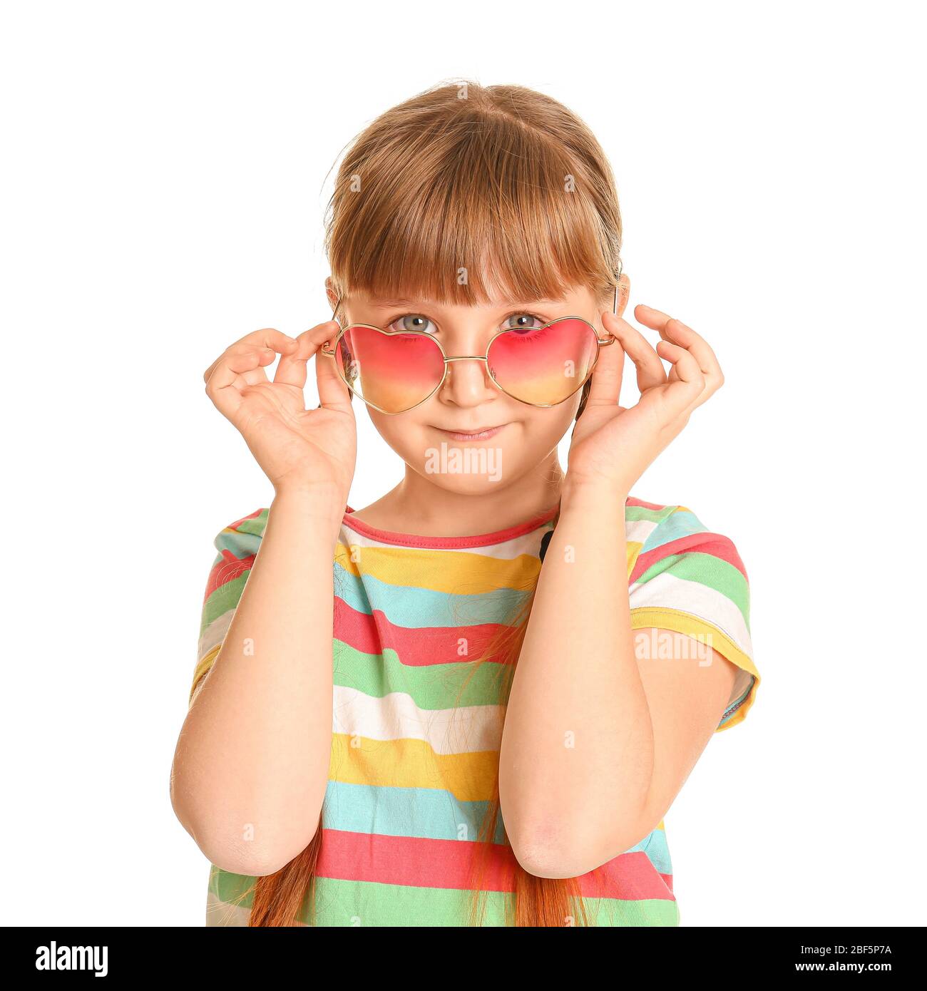 Funny little girl with sunglasses on white background Stock Photo Alamy