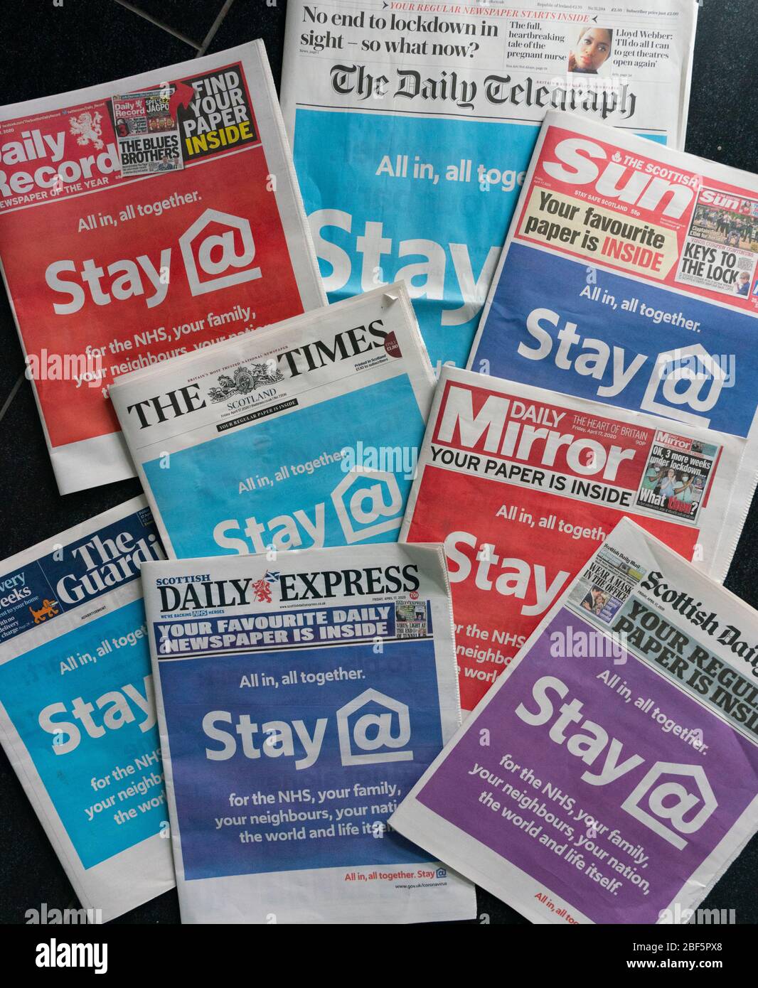 Edinburgh, Scotland, UK. 17 April 2020. Front covers of all UK newspapers carry government headline warning to stay at home during the coronavirus lockdown. Iain Masterton/Alamy Live News Stock Photo