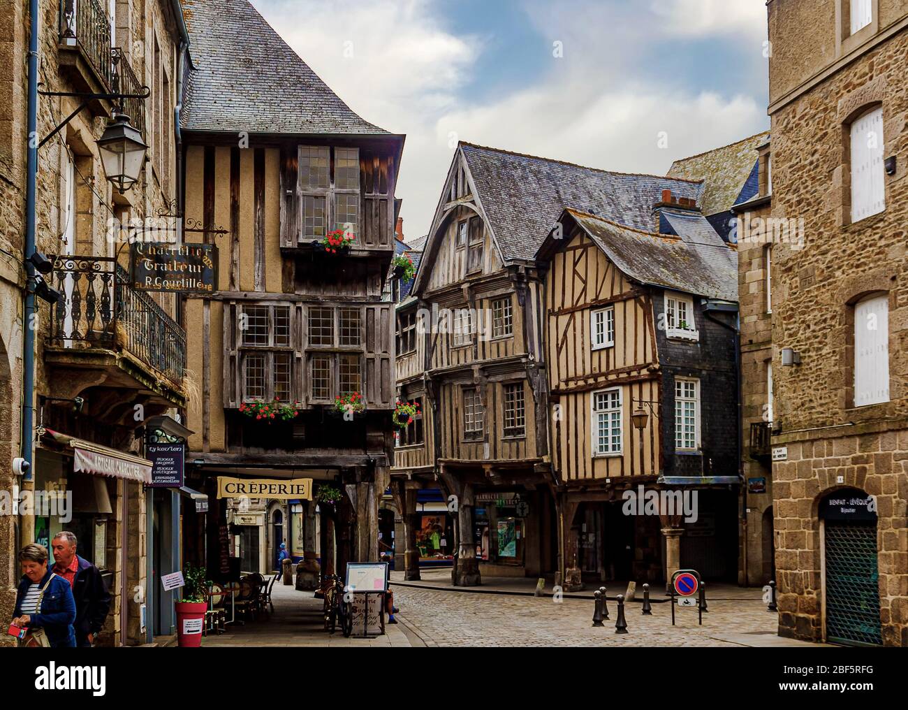 Dinan, Brittany, France - 31 May 2018: Old house on medieval street of Rue de Jerzual in Dinan, Brittany, France. Stock Photo