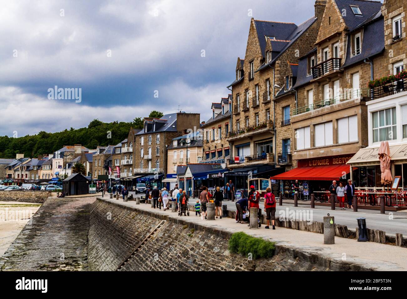 Cancale, Brittany, France - 31 May 2018: Embankment of a seaside town at low tide. Stock Photo