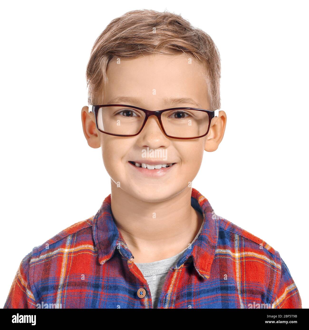 Cute little boy with eyeglasses on white background Stock Photo - Alamy