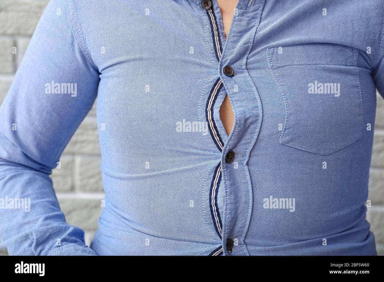 Tight clothes hi-res stock photography and images - Alamy