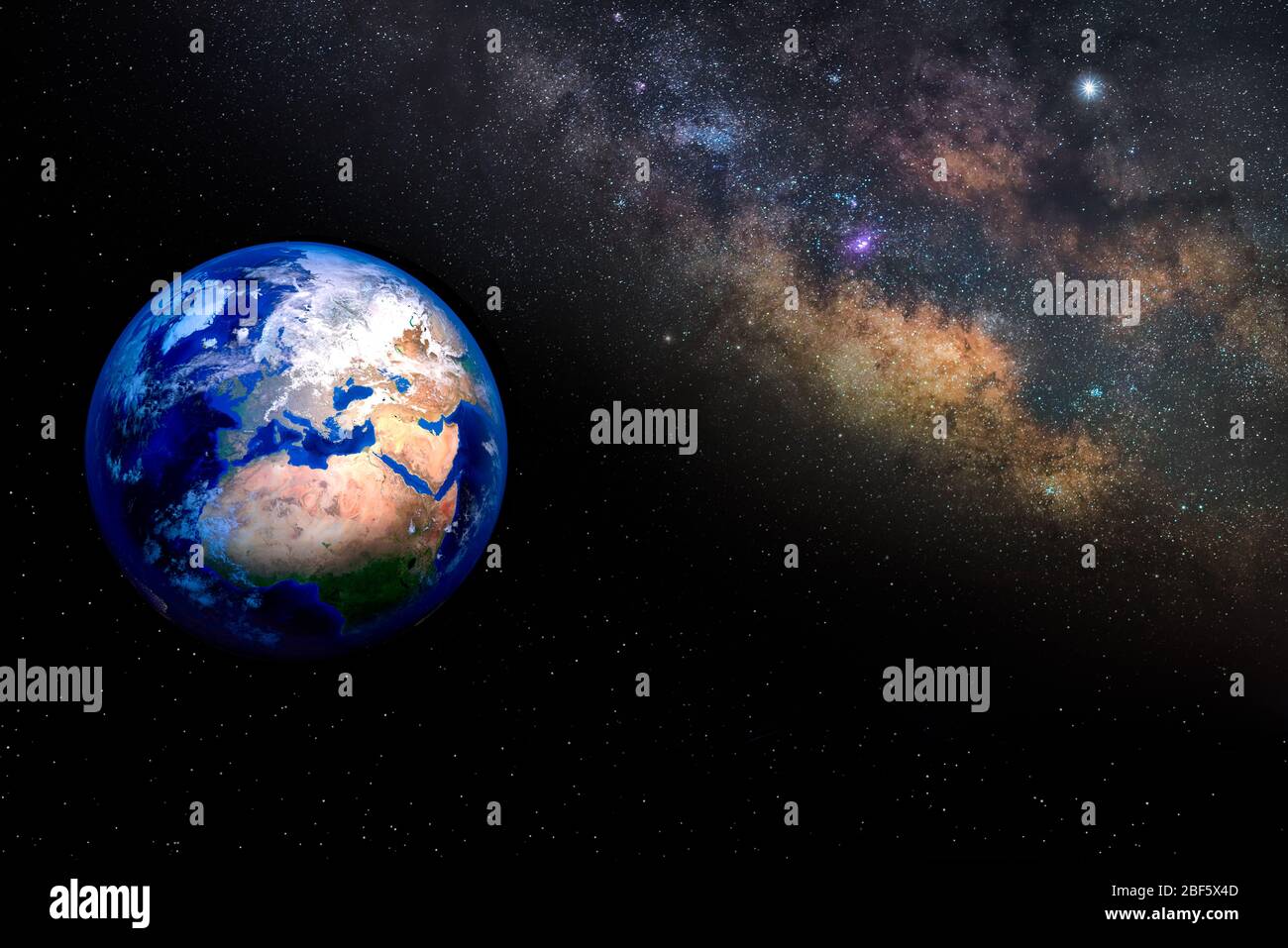 Planet Earth in deep space next to the Milky Way with blue tones in background Stock Photo