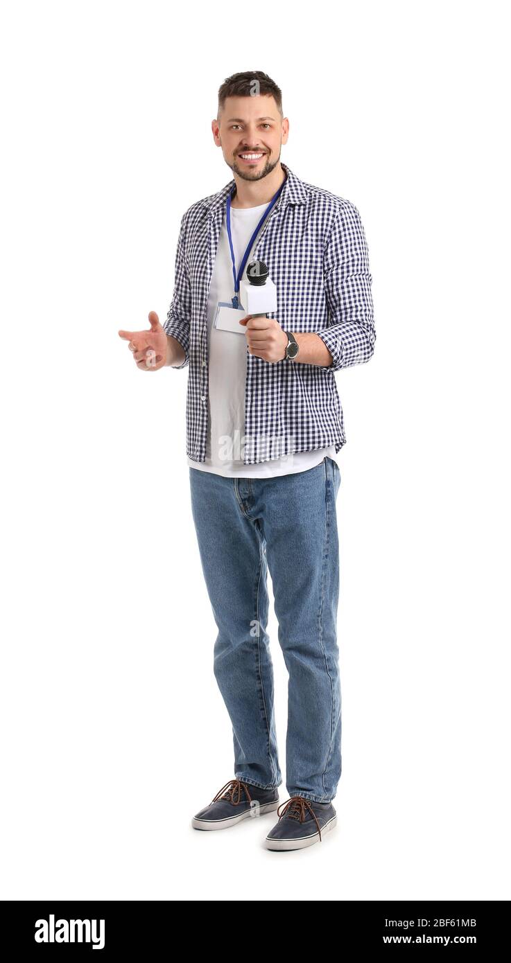 Male journalist with microphone on white background Stock Photo - Alamy