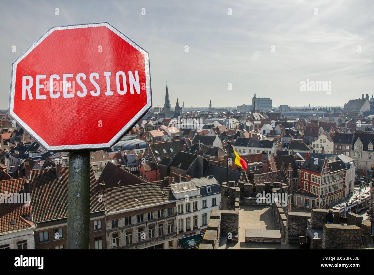 Recession stop sign with view of Brussels in Belgium. Financial crash in world economy because of coronavirus pandemic. Global economic crisis Stock Photo