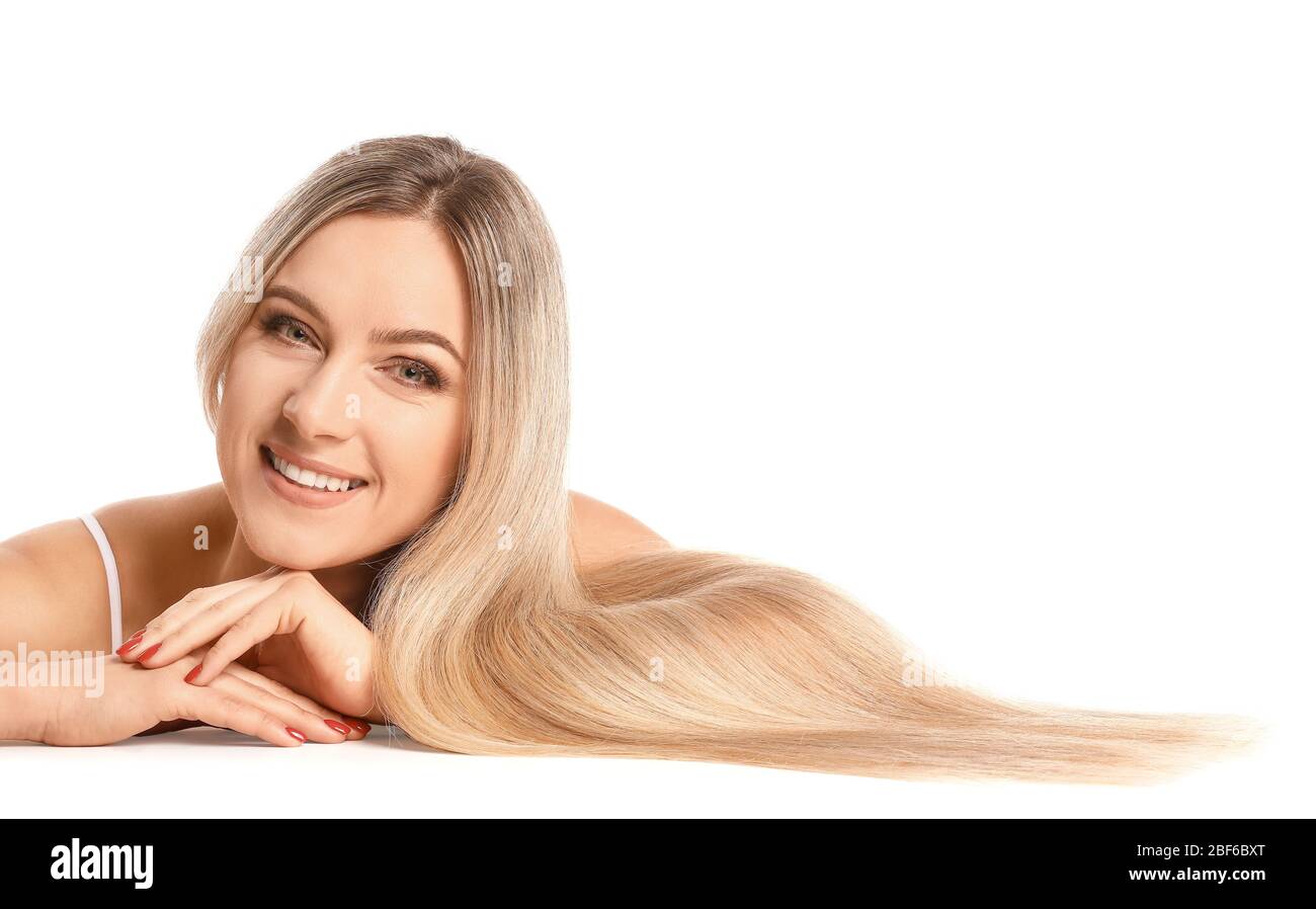 Beautiful young woman with long hair on white background Stock Photo ...