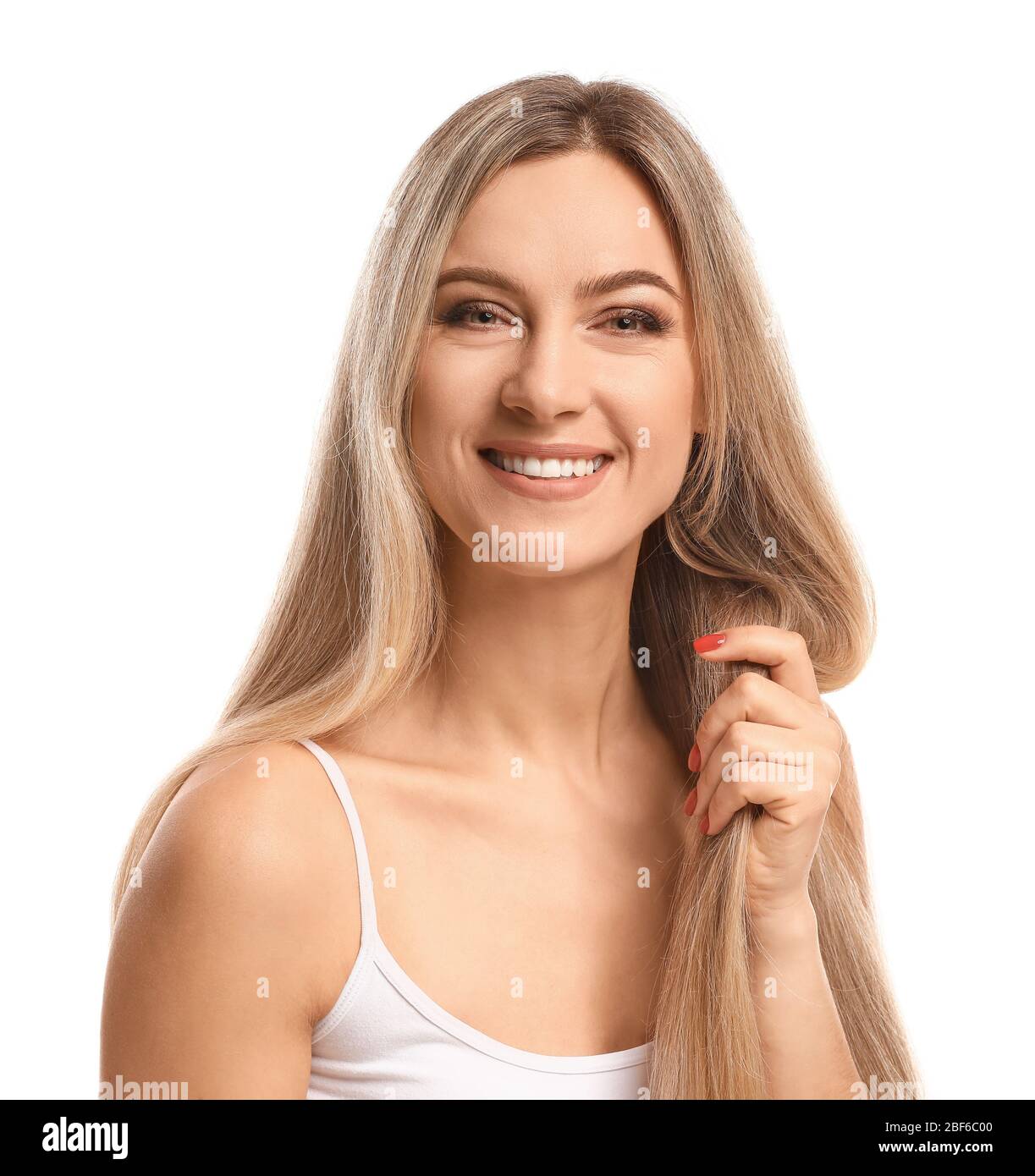 Beautiful young woman with long hair on white background Stock Photo ...