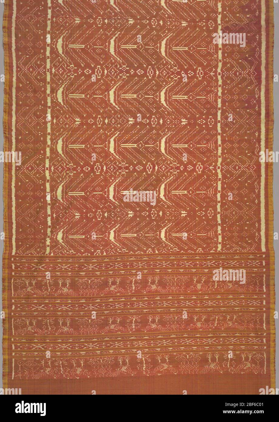 Sawit Pattern Sarong. Warps are bright yellow and wefts are ikat dyed in dark red ...