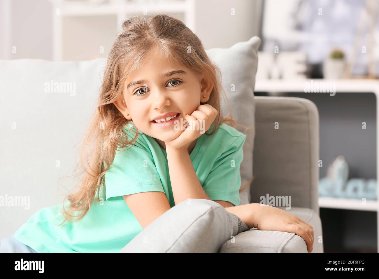 Portrait of happy little girl at home Stock Photo - Alamy