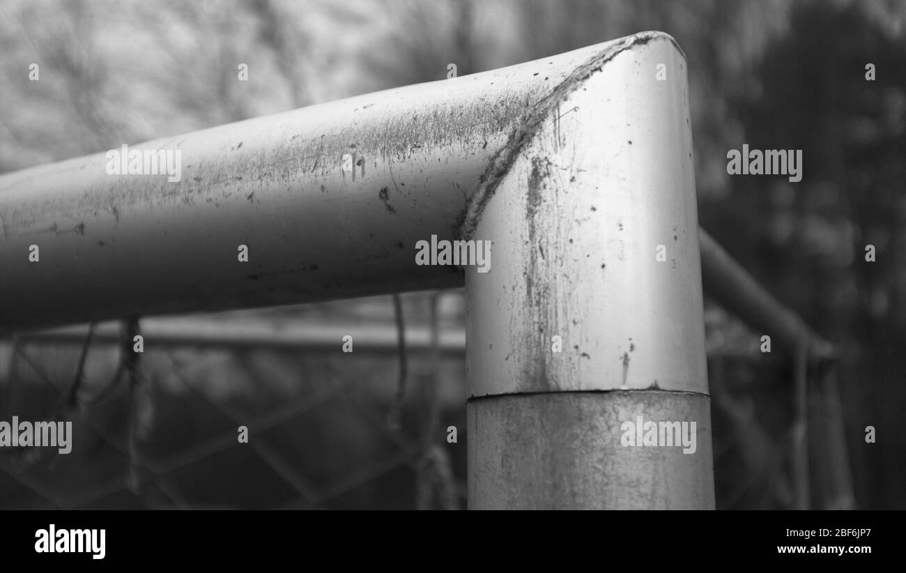 Close up on a soccer / football goal. Black and white. Stock Photo