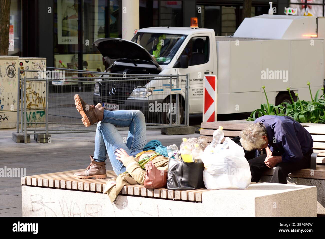 Vienna, Austria. 17th Apr, 2020. The exit restrictions in Austria have been extended to end of April  2020. A homeless woman enjoys the warm spring weather. Credit: Franz Perc / Alamy Live News Stock Photo