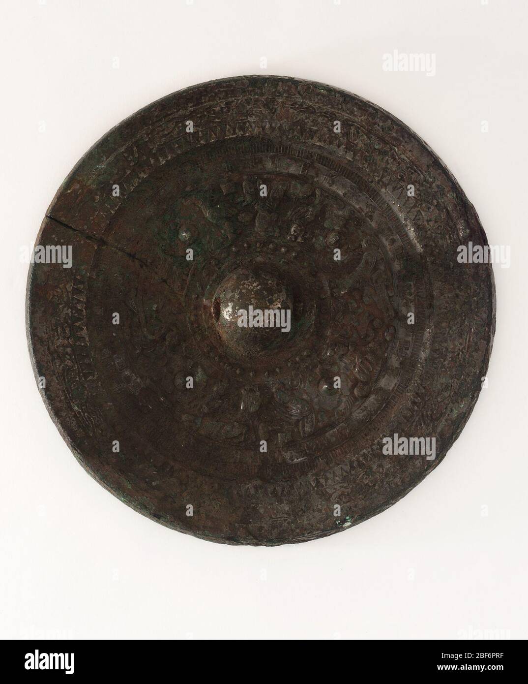 ; China; 206 B.C.E.-220 C.E.; Bronze; Diam x D: 22.8 x 2.1 cm (9 x 13/16 in); Gift of Charles Lang Freer Stock Photo