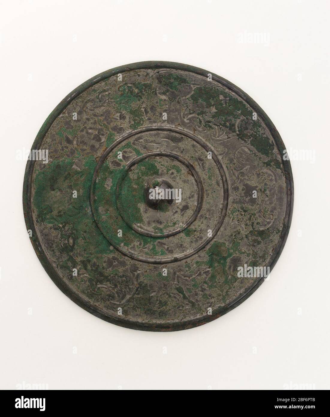 ; China; 3rd century B.C.E.; Bronze; Diam x D: 16.9 x 0.9 cm (6 5/8 x 3/8 in); Gift of Charles Lang Freer Stock Photo