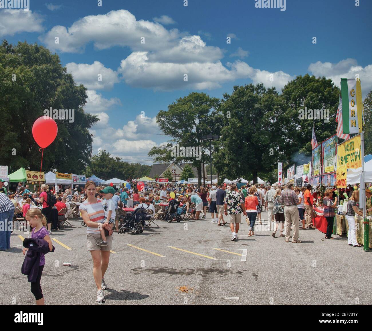 Families at Food Area of Festival Stock Photo