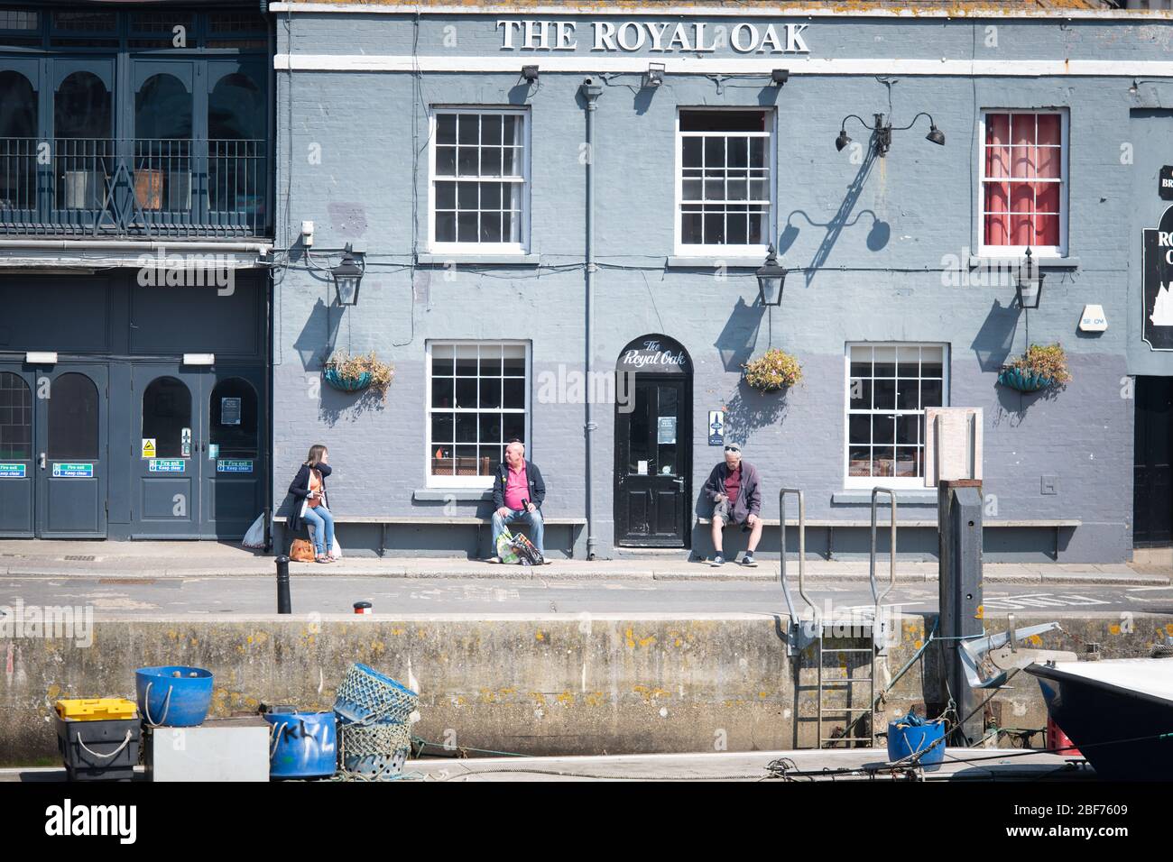 Weymouth, Dorset, UK. 11th April 2020. With the coronavirus lockdown effectively adhered to in the Dorset seaside town of Weymouth, guesthouse landlad Stock Photo