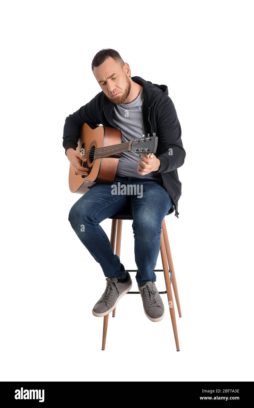 Male singer with guitar on white background Stock Photo Alamy