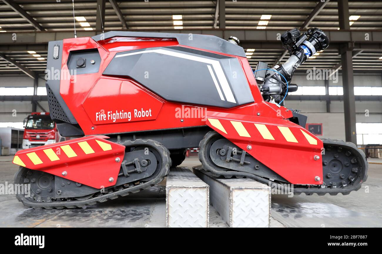 200417) -- ANSHAN, April 17, 2020 (Xinhua) -- A fire fighting robot crosses  the obstacle outside of Anshan Hengye Special Vehicle Manufacturing Co.,  Ltd. in Anshan, northeast China's Liaoning Province, April 14,