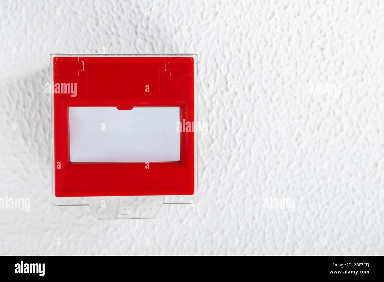 Modern manual call point on white background Stock Photo - Alamy