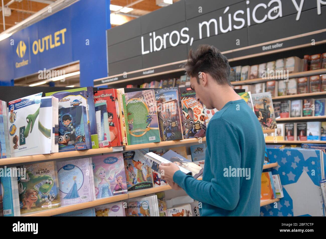 a customer reading a book Stock Photo