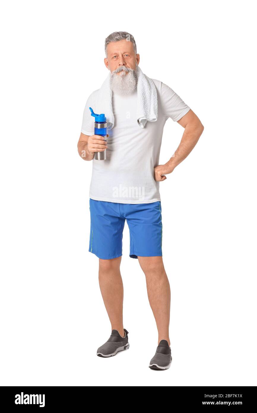 Sporty elderly man with bottle of water on white background Stock Photo ...