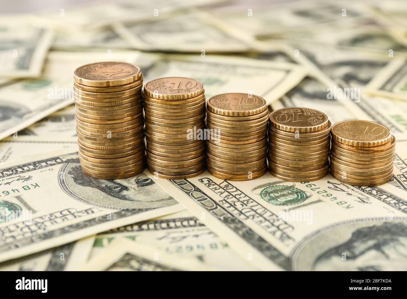 Many coins dollar banknotes hi-res stock photography and images - Alamy
