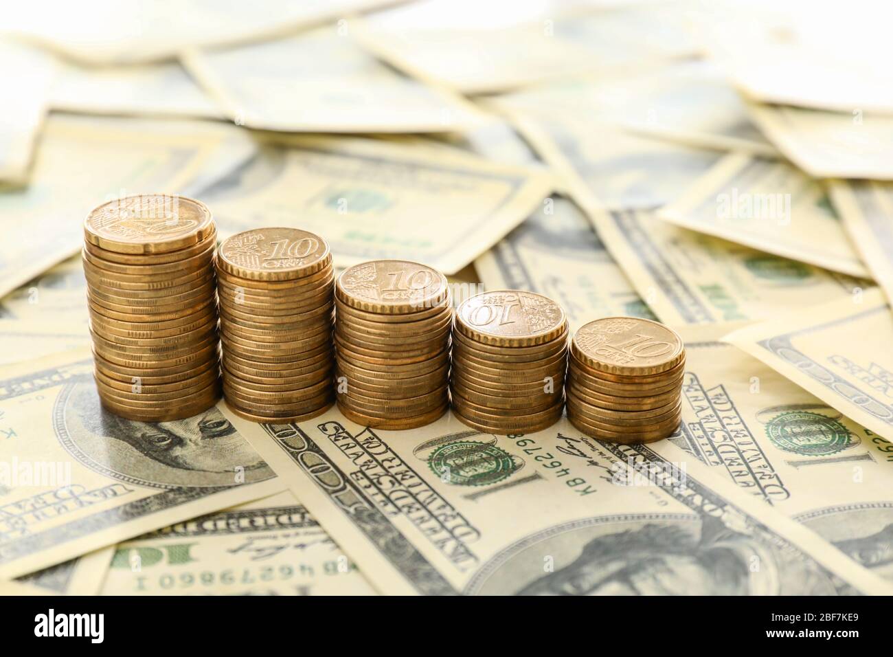 Many coins dollar banknotes hi-res stock photography and images - Alamy