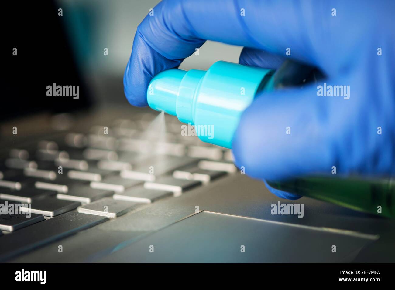 Computer keyboard disinfection with an antibacterial disinfectant spray