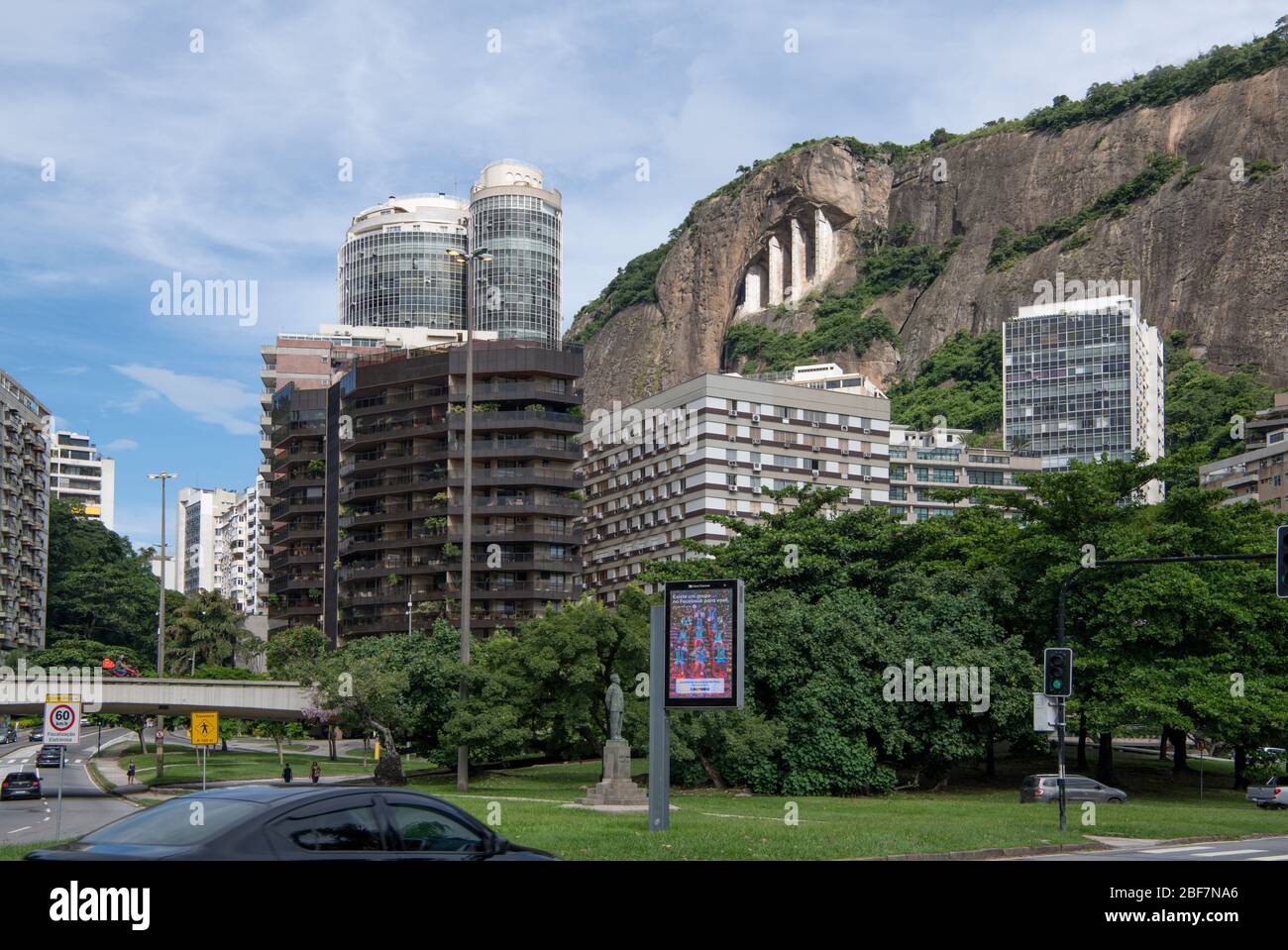Rio de Janeiro, Brasil-  February 27, 2020: Rodrigo de Freitas Lagoon. Avenue Henrique Dodsworth. Moving transport and citizens Stock Photo